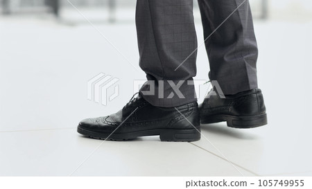 Stylish businessman shoes in focus in office 105749955