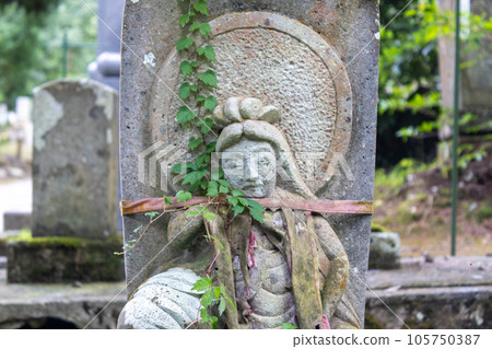 Stone statue (public art) of Ojizou san, protector of children, Japan. 105750387