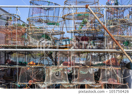 Fishing nets and equipment at Kanaiwa harbour. Kanazawa, Japan. 105750426