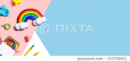 School supplies with a rainbow - overhead view School supplies with a rainbow - overhead view 105750451