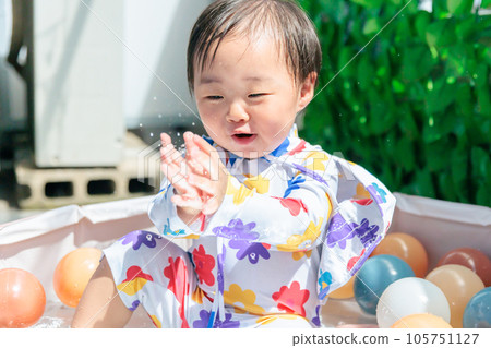 1-year-old's pool debut Playing in the pool at home 105751127
