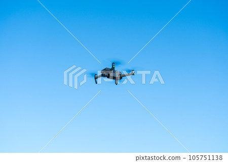 Drone flying in the clear sky of summer | Drone image | Aerial image Drone flying in the clear sky of summer | Drone image | Aerial image 105751138
