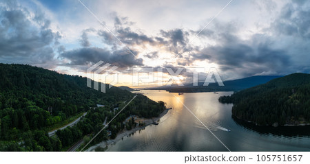 Aerial View of a Highway in City. Cloudy Sunset Sky. Aerial View of a Highway in City. Cloudy Sunset Sky. 105751657