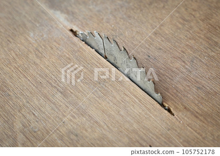 sharp metal saw on wood plank texture background, construction machine sharp metal saw on wood plank texture background, construction machine 105752178