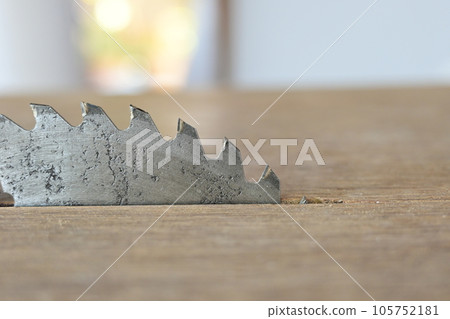 sharp metal saw on wood plank texture background, construction machine sharp metal saw on wood plank texture background, construction machine 105752181