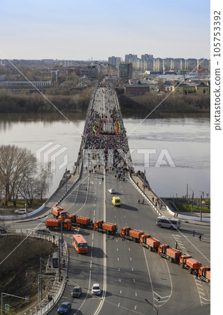 Procession in honor of Christian religious holiday Easter on Kanavinsky Bridge in Nizhny Novgorod Procession in honor of Christian religious holiday Easter on Kanavinsky Bridge in Nizhny Novgorod 105753392