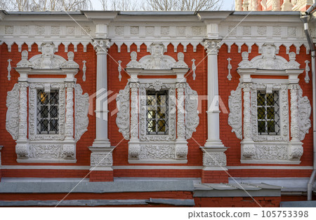 Windows with stucco platbands and bas-reliefs of Cathedral of Most Holy Theotokos of 18 century 105753398