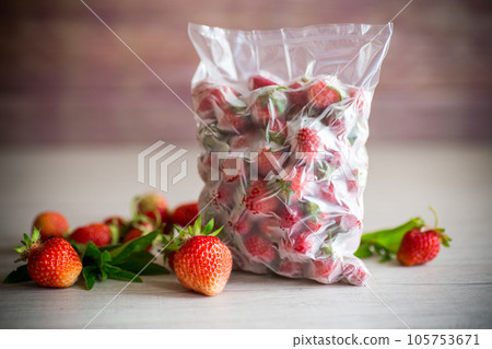 frozen fresh strawberries in a vacuum bag frozen fresh strawberries in a vacuum bag 105753671