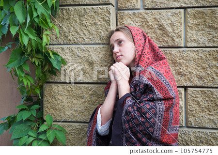 Young girl pray to God Young girl pray to God 105754775