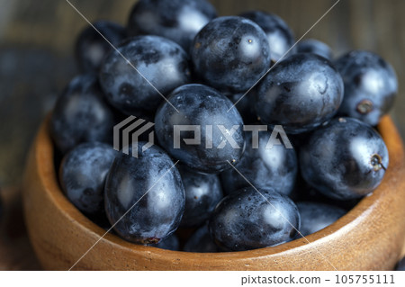 Unwashed blue grapes in the dust Unwashed blue grapes in the dust 105755111