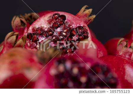 Red ripe pomegranate ready for eating Red ripe pomegranate ready for eating 105755123