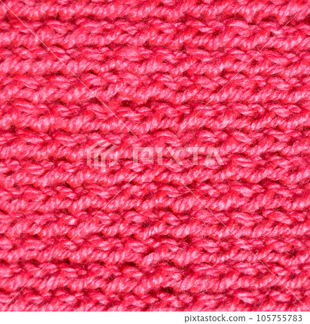 Handmade knitted fabric pink and red wool background texture Handmade knitted fabric pink and red wool background texture 105755783