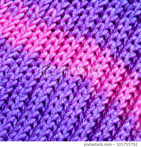 Handmade knitted fabric purple wool background texture 105755792