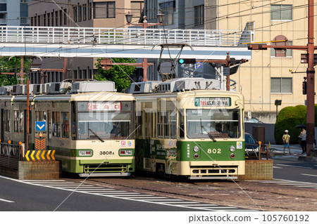 A Hiroden tram running through the center of Hiroshima City 105760192