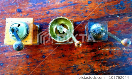 Antique coffee grinders on the table in the garden. 105762044