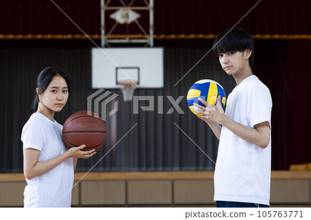 High school boys and girls who work hard at club activities High school boys and girls who work hard at club activities 105763771