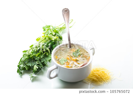 cooked hot soup with noodles and vegetables 105765072