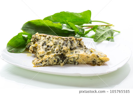 fried egg omelet with spring sorrel inside fried egg omelet with spring sorrel inside 105765585