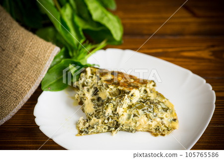 fried egg omelet with spring sorrel inside fried egg omelet with spring sorrel inside 105765586