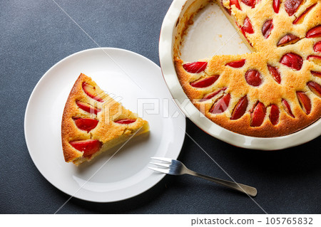 Homemade plum pie with almond flour. Top view image for menu or recipe 105765832