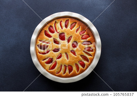 Homemade plum pie with almond flour. Top view image for menu or recipe 105765837