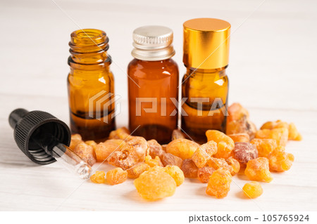 Frankincense or olibanum aromatic resin isolated on white background used in incense and perfumes. Frankincense or olibanum aromatic resin isolated on white background used in incense and perfumes. 105765924