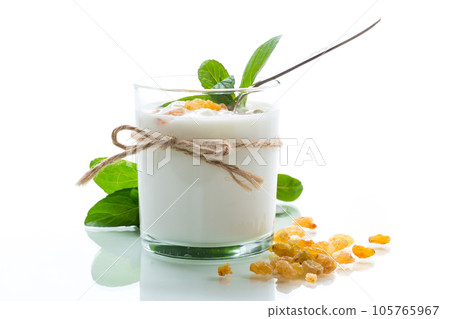 sweet homemade yogurt with raisins in a glass 105765967