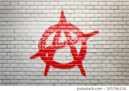 Anarchy sign painted on a white faience wall Anarchy sign painted on a white faience wall 105766138