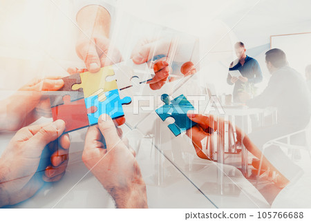 Team working background with puzzles. Double exposure effects 105766688
