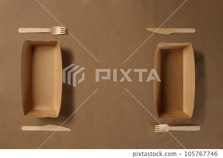 Eco friendly disposable tableware. Biodegradable craft dishes. Recycling concept. Also used in fast food, restaurants, takeaways, picnics. Close-up. 105767746