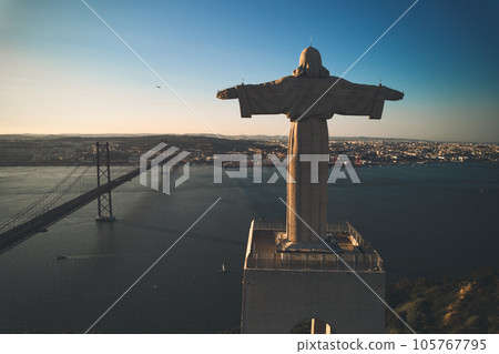 The 25 de Abril Bridge and The Sanctuary of Christ monument. Lisbon.. The 25 de Abril Bridge and The Sanctuary of Christ monument. Lisbon.. 105767795