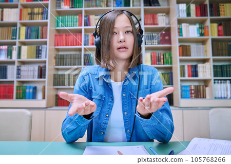 Close-up webcam view of face female student, inside university library 105768266