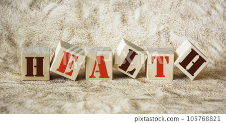 Wooden blocks with text Care on a light background Wooden blocks with text Care on a light background 105768821