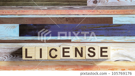 LICENSE word made up of building blocks on colored background 105769176