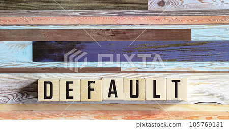 The word DEFAULT on wooden cubes. Non-fulfillment, non-fulfillment, non-payment, non-payment of debt The word DEFAULT on wooden cubes. Non-fulfillment, non-fulfillment, non-payment, non-payment of debt 105769181