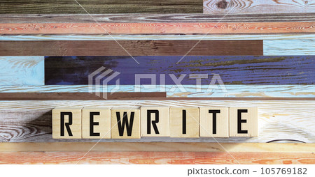 concept word rewrite on cubes on a dark wooden background concept word rewrite on cubes on a dark wooden background 105769182