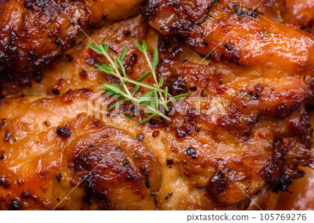 Delicious baked chicken meat with salt, spices and herbs Delicious baked chicken meat with salt, spices and herbs 105769276