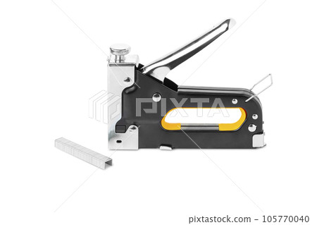 Iron construction stapler and staples isolated on a white background Iron construction stapler and staples isolated on a white background 105770040