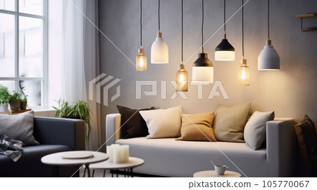 Several pendant lights of different shapes above a sofa in a cozy living room. Elegant modern interior design with an emphasis on lighting. Mockup, 3D rendering. 105770067