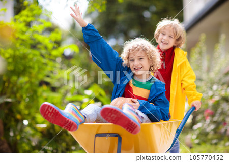 Kids on pumpkin patch. Child autumn outdoor fun. Kids on pumpkin patch. Child autumn outdoor fun. 105770452