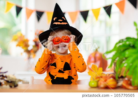 Child in Halloween costume. Kids trick or treat. 105770505