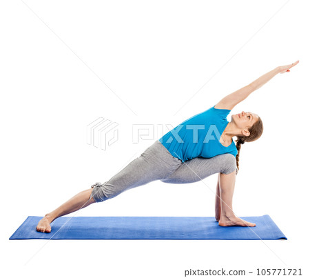 Yoga - young beautiful slender woman yoga instructor doing Extended Sides Angle Pose (Utthita Parsvakonasana) asana exercise isolated on white background 105771721