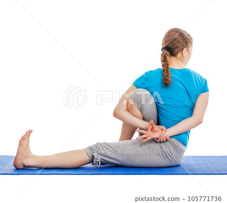Yoga - young beautiful slender woman yoga instructor doing Forward Bends Sage Twist C pose (Marichyasana C) asana exercise isolated on white background 105771736