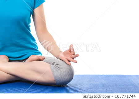 Close up of yoga Padmasana (Lotus pose) cross legged position for meditation with Chin Mudra - psychic gesture of consciousness Close up of yoga Padmasana (Lotus pose) cross legged position for meditation with Chin Mudra - psychic gesture of consciousness 105771744