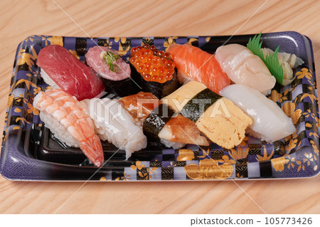 Delicious packed sushi Delicious packed sushi 105773426