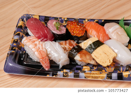 Delicious packed sushi 105773427
