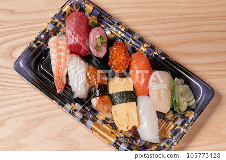 Appetizing packed tray sushi Appetizing packed tray sushi 105773428