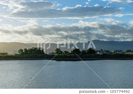 Summer 2023 Dawn at Kyo Yakushiji Temple in Nara West, the townscape of Yamatokoriyama in a refreshing morning 105774492