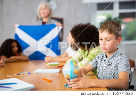 Ten-year-old schoolboy is studying the history of Scotland Ten-year-old schoolboy is studying the history of Scotland 105774520