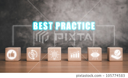 Best practice concept, Wooden block on desk with practice icon on virtual screen. Best practice concept, Wooden block on desk with practice icon on virtual screen. 105774583